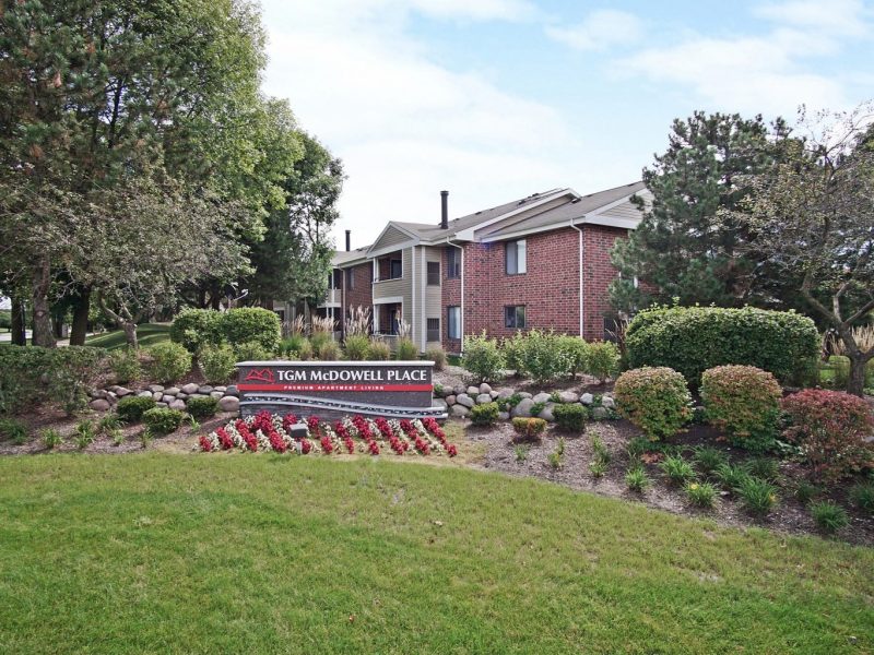 This image shows an expansive view of the TGM McDowell place monument starring its landscaping charm and natural ambiance that was a pleasant location to call home.
