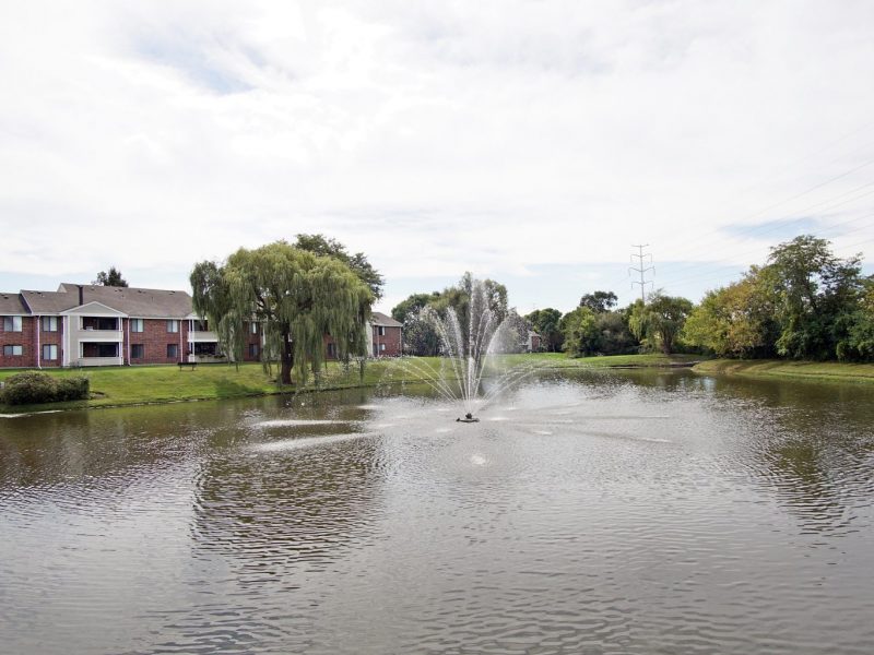 This image shows the landscape view of the TGM Mcdowell Place featuring the pond fountain.