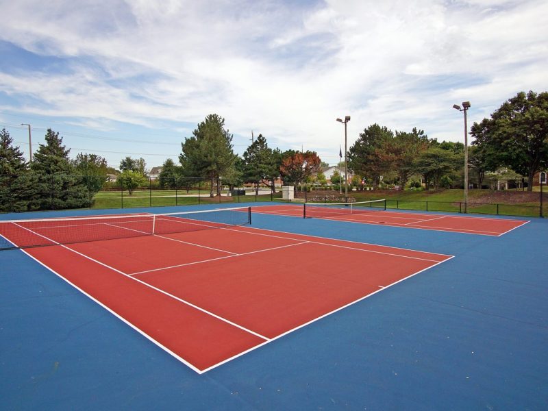 This image shows the two lighted tennis court in TGM McDowell Place that was ideal for sports recreation.